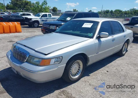 1999 Mercury Grand Marquis Ls из США, поврежденный, VIN 2MEFM75W9XX619565